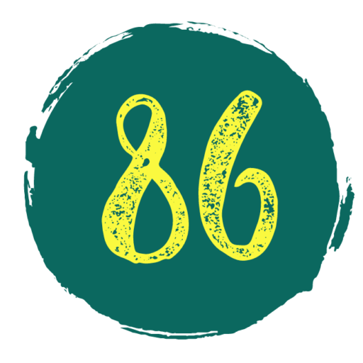Studio86 logo. 86 is yellow inside a teal green circle