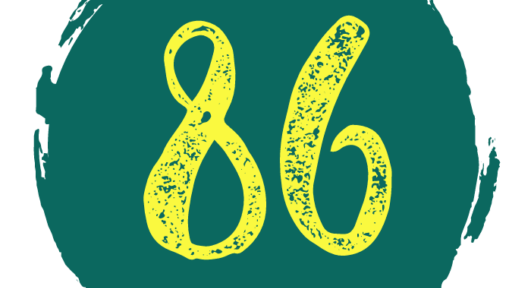 Studio86 logo. 86 is yellow inside a teal green circle